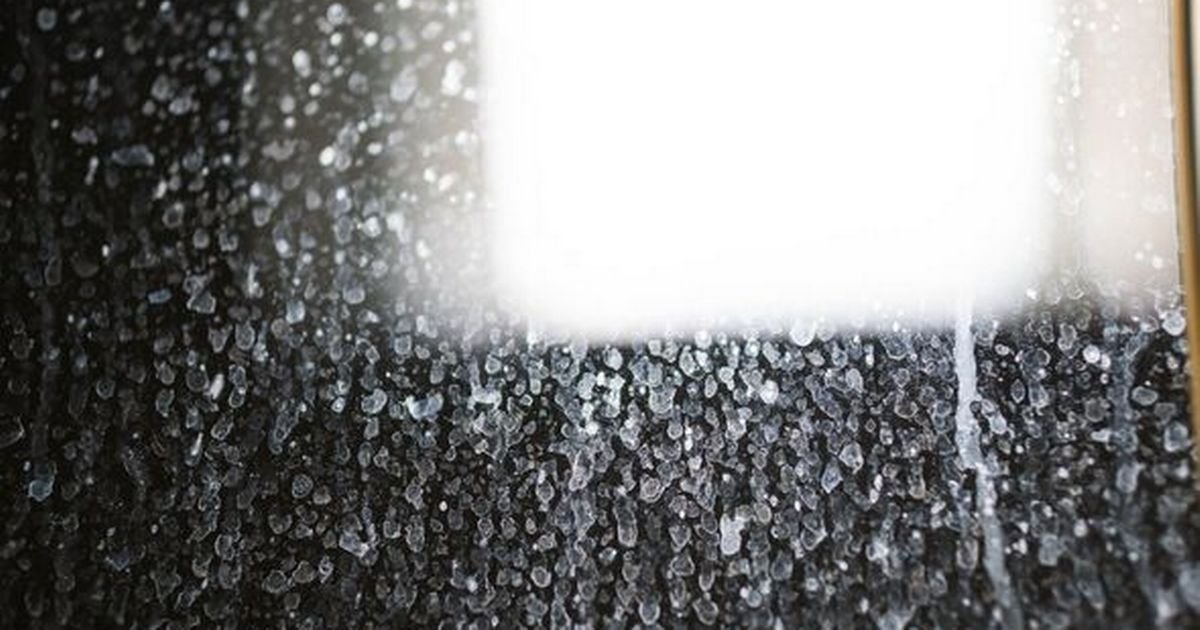 The Surprising Bathroom Item That Removes Water Marks from Shower Glass